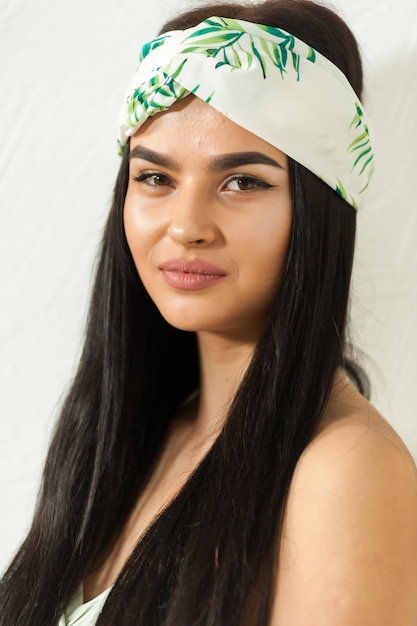 Young charming woman wearing beach clothes