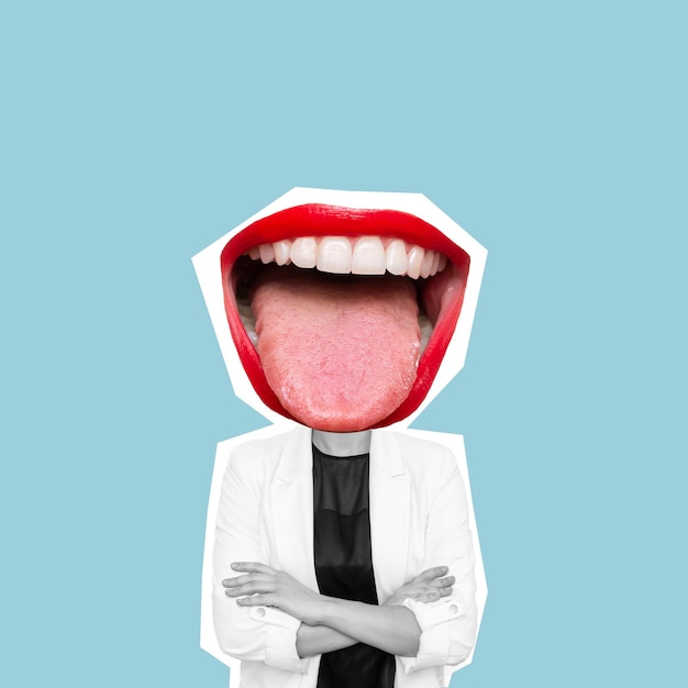 Young cheerful business woman headed by wide open mouth shows tongue standing with her arms crossed