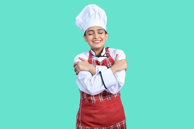 young chef girl white outfit crossed arms indian pakistani model