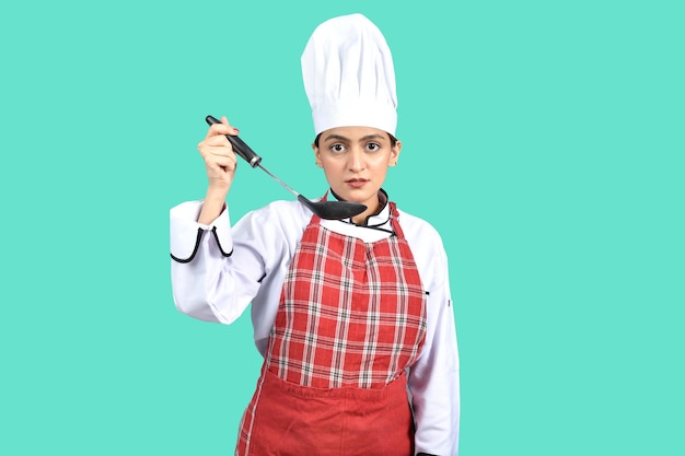 
young chef girl white outfit tasting food indian pakistani model
