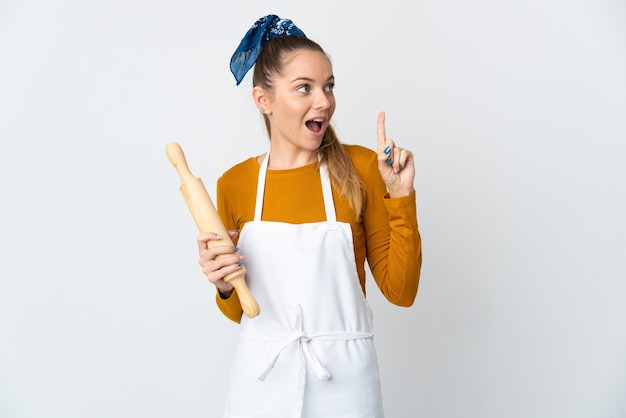 Young chef over isolated background