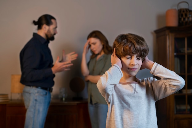 Photo young child suffering from parent abuse at home