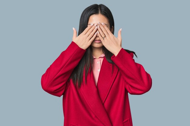 Young chinese woman expressing emotions isolated