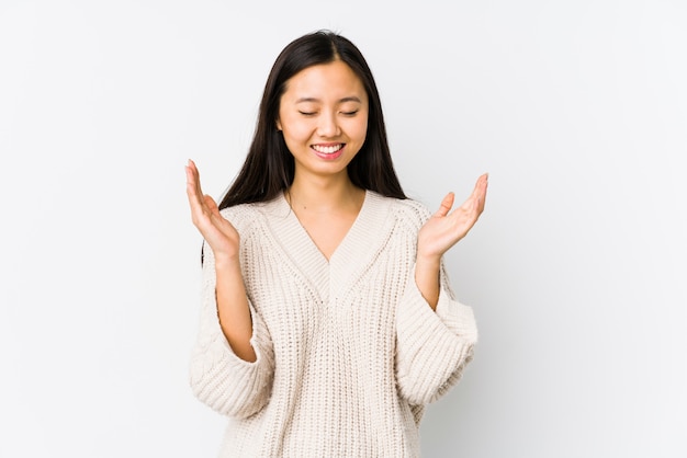 Young chinese woman isolated joyful laughing a lot. Happiness concept.