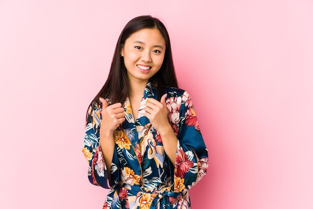 Young chinese woman wearing a kimono pajama