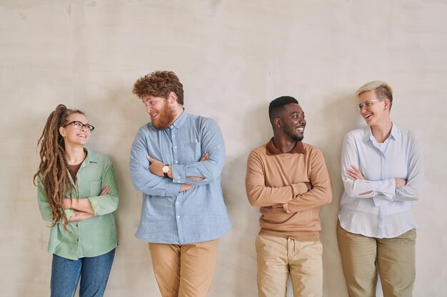 Young colleagues chatting during break