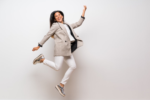 Young Colombian girl jumping