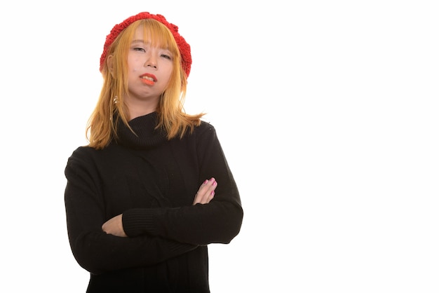 Young confident Asian woman with arms crossed