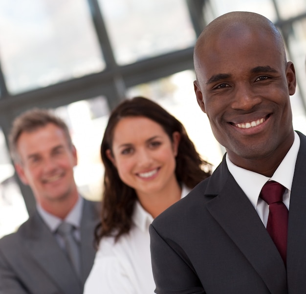 Young confident business team looking at the camera