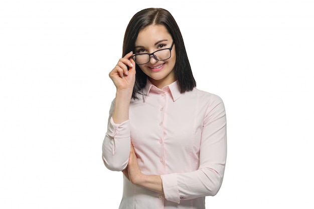 Young confident business woman looking into the camera