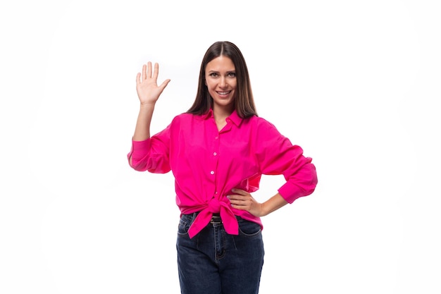 Young confident caucasian brunette woman wears bright crimson shirt