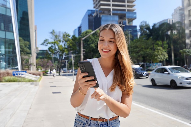 Young confident entrepreneur going to work in her successful start up business about technology and green energy Corporate and lifestyle concepts