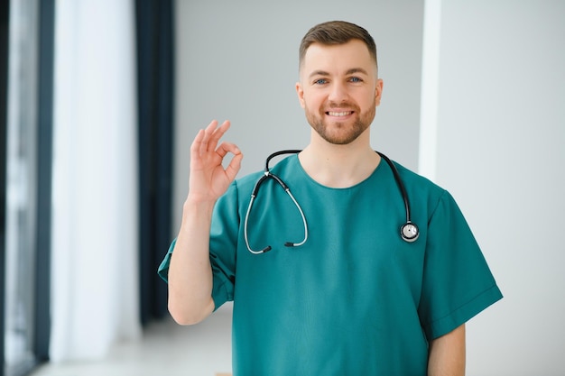 Young and confident male doctor portrait. Successful doctor career concept.