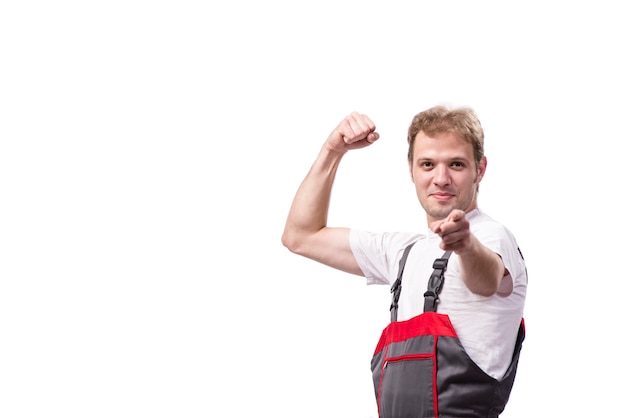 Young construction worker wearing coveralls isolated on white