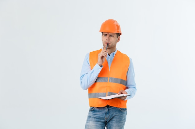 Young construction worker with expression