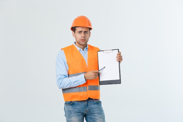 Young construction worker with expression