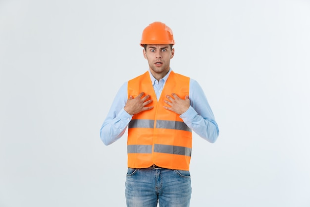 Young construction worker with expression