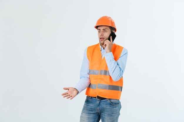 Young construction worker with expression