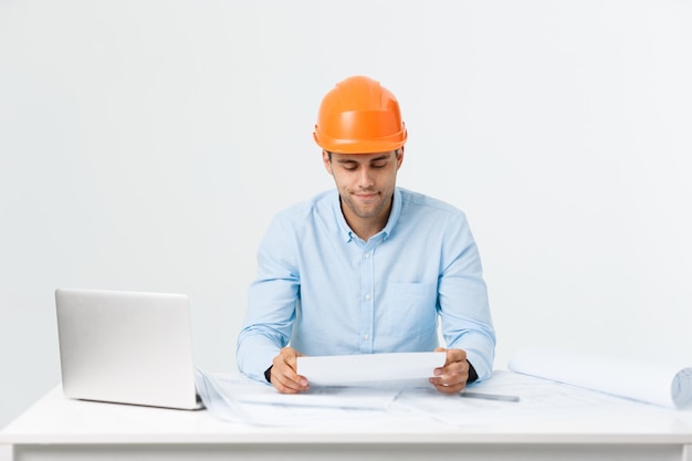 Young construction worker with expression