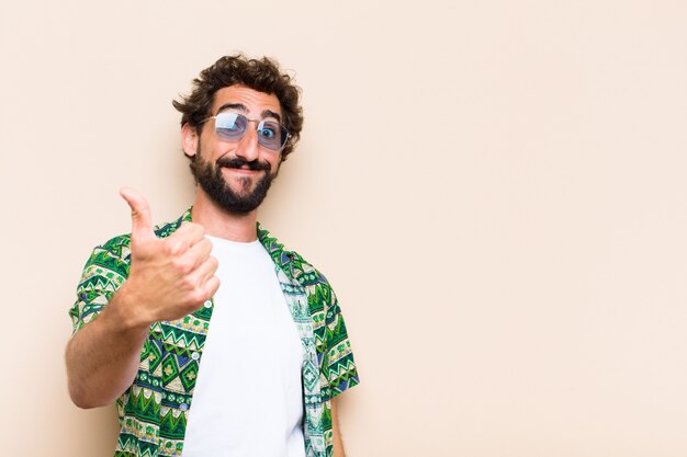 Young cool bearded man allright gesture