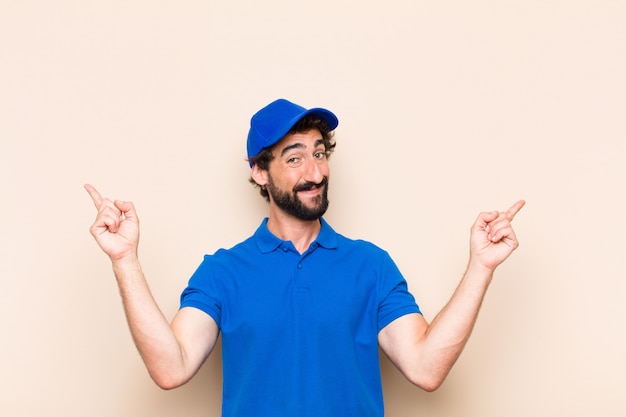 Young cool bearded man celebrating a victory