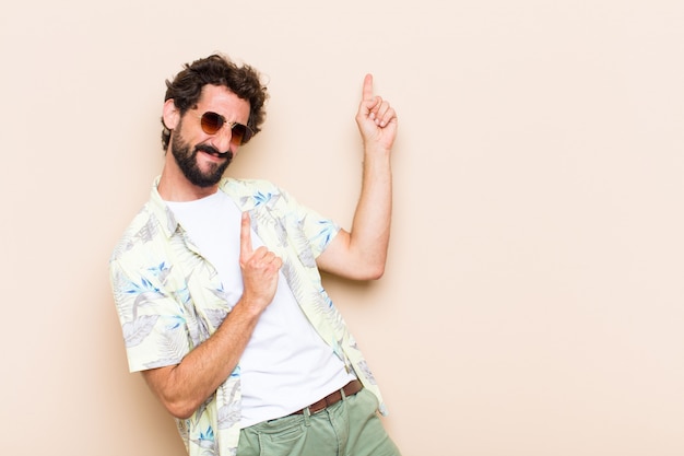 Young cool bearded man dancing