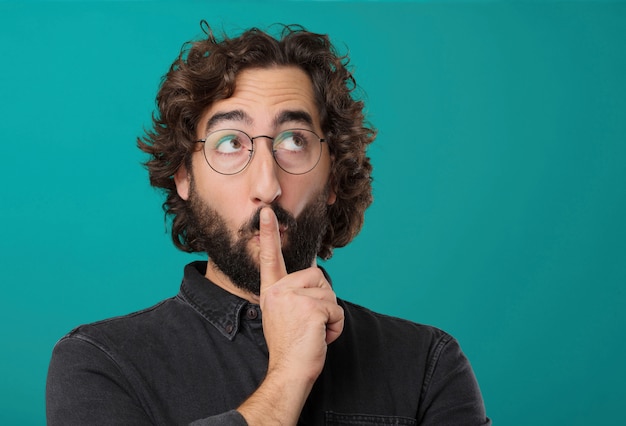 Young cool bearded man posing