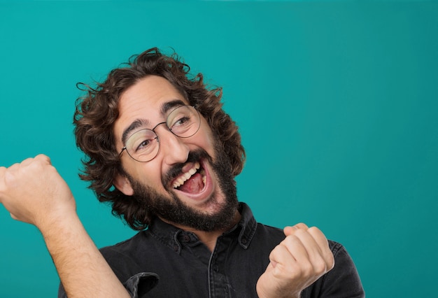 Young cool bearded man posing