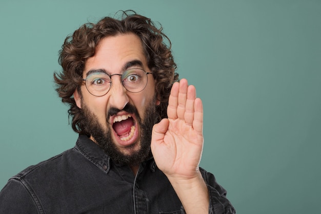 Young cool bearded man posing