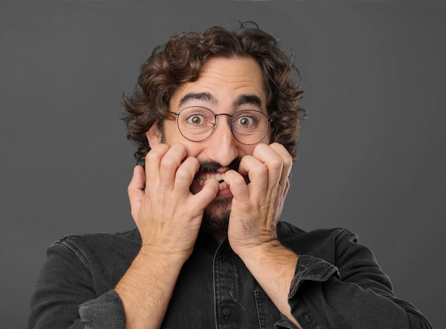 Young cool bearded man posing