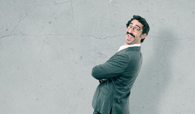 Young cool man against grunge background