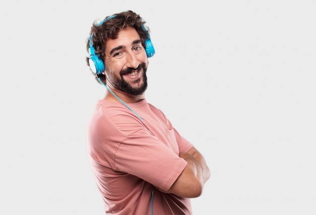 Young cool man expressing with headphones