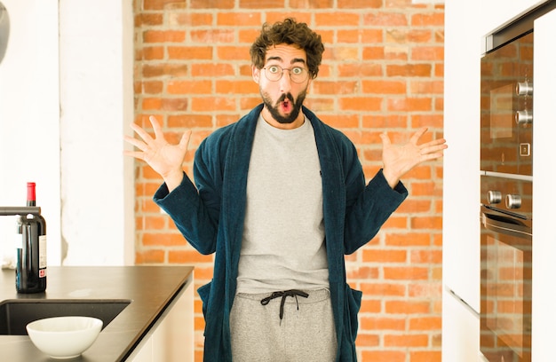 Young cool man at kitchen