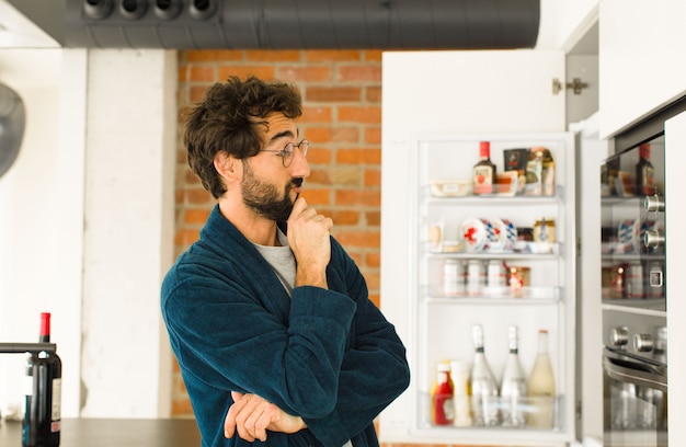 Young cool man at kitchen