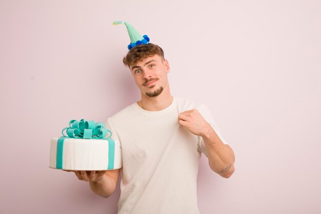 Young cool man looking arrogant successful positive and proud birthday concept