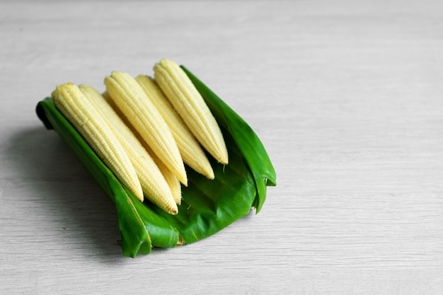 Young corn in a banana leaf. Eco friendly packaging