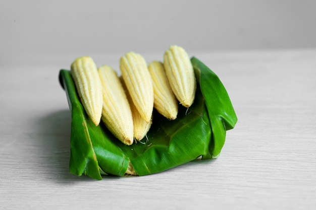 Young corn in a banana leaf. Eco friendly packaging
