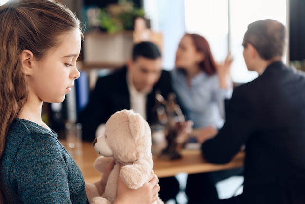 Photo young couple arranges guardianship of little girl.