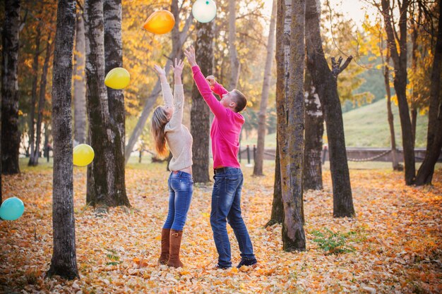 Young couple in autumn park