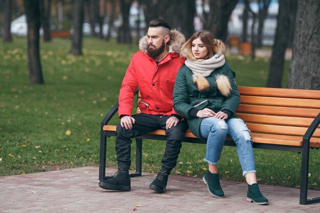 young couple in autumn in park