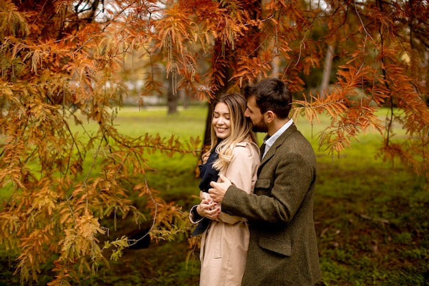 Young couple in the autumn park