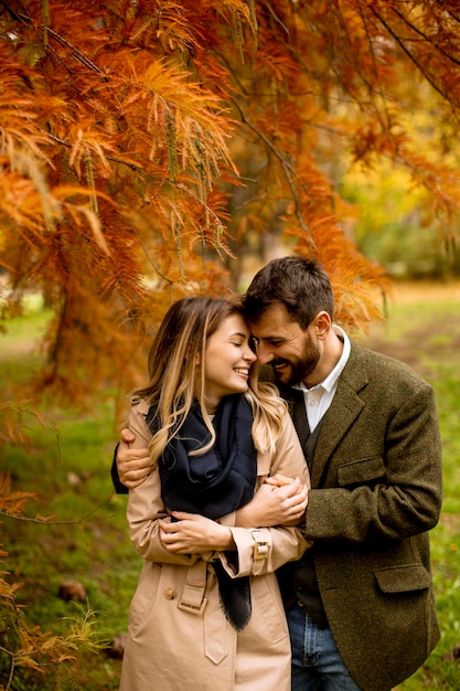 Young couple in the autumn park