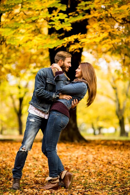 Young couple in the autumn park