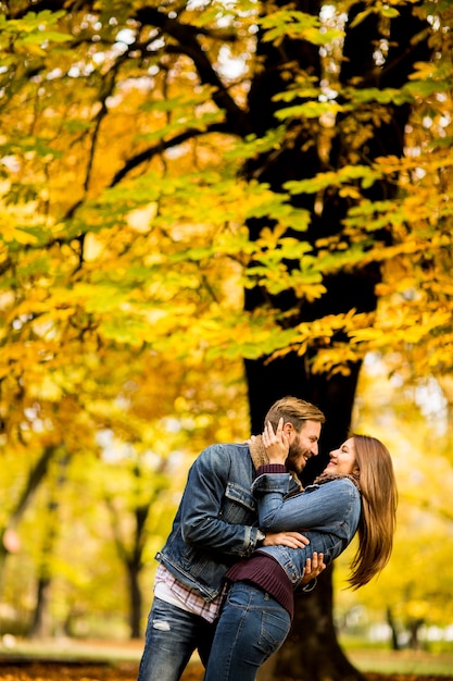 Young couple in the autumn park