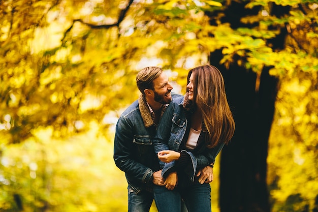 Young couple in the autumn park