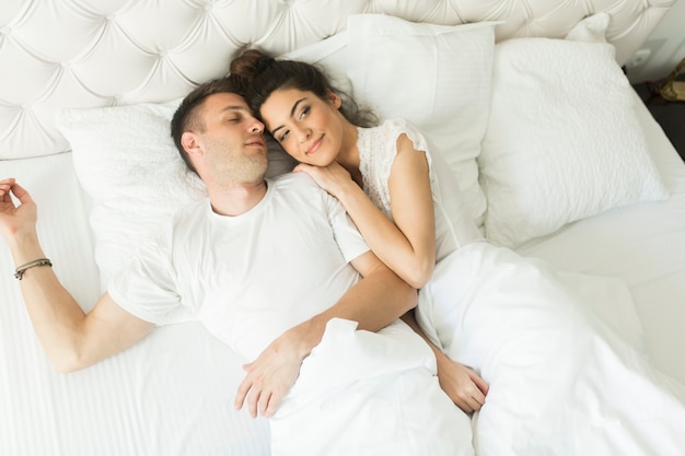 Young couple in bed