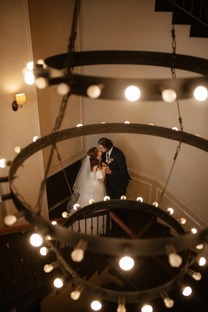 Young couple bride and groom in a white dress