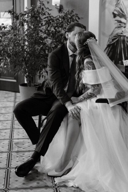 Young couple bride and groom in a white dress