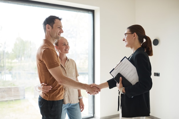 Young Couple Buying House