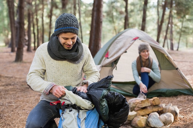 Young couple camping in the wilderness